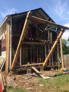 A house is being built with wooden beams.