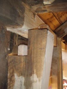 Close up view of wooden beams in attic